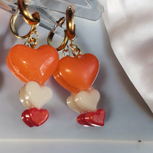 Boucles d'oreille coeur en resine